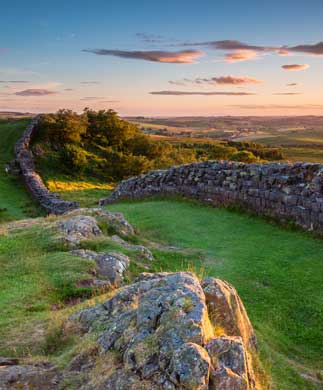 Hadrian_s-Wall-near-sunset-at-Walltow-iStock-811489896_323-390