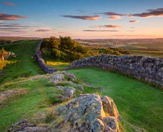 Hadrian_s-Wall-near-sunset-at-Walltow-iStock-811489896_333-270