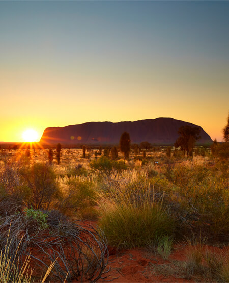 Solnedgang over Ayers Rock/Uluru